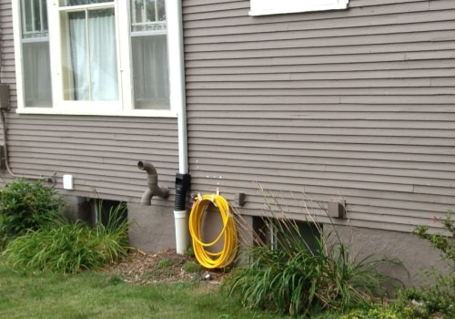 Where should downspouts end?